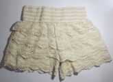 Shorts saia crochê